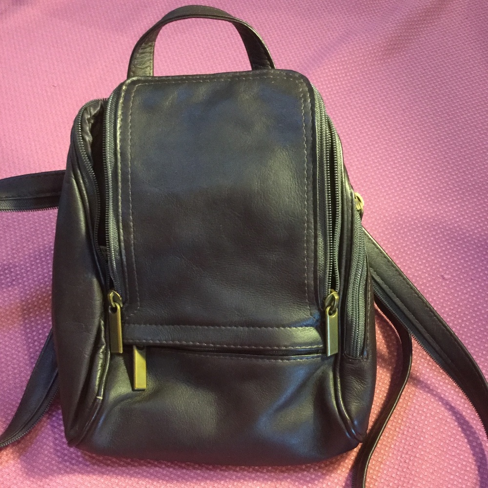 Dark brown leather backpack